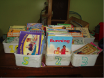 Books sorted into three boxes labelled 5, 2 and 3